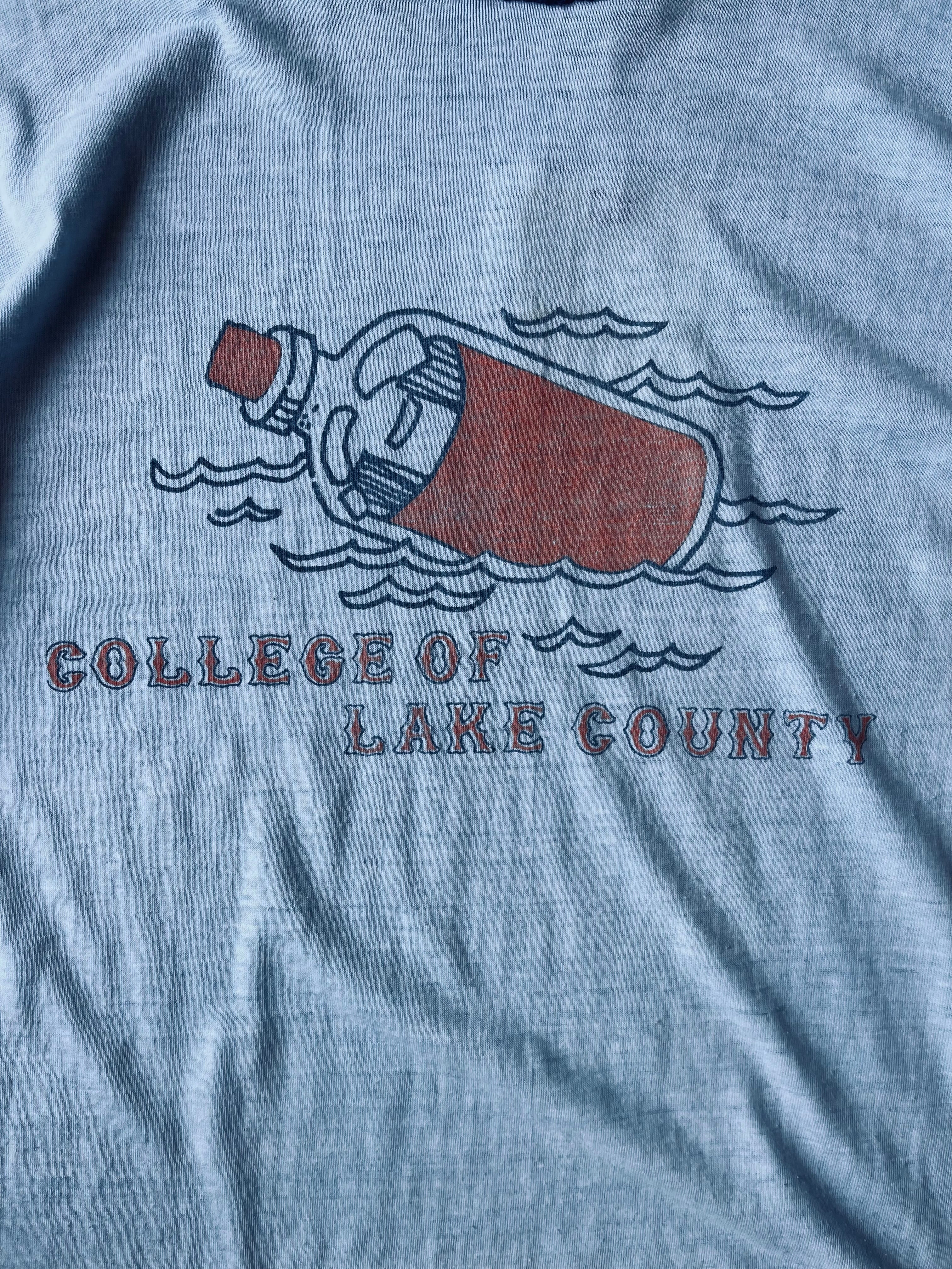 1980's Champion “College of Lake County” Tee | X-Large – Nylo Wool